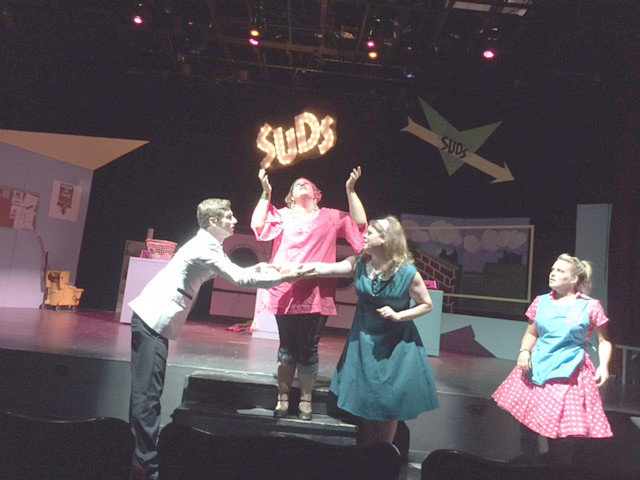 From left, Micah Brooks, Brandi Bridges, Micah Graham and Lanette Garza in a scene from Suds! The Rocking 60s Musical Soap Opera, at Lake Country Playhouse in Mineola.