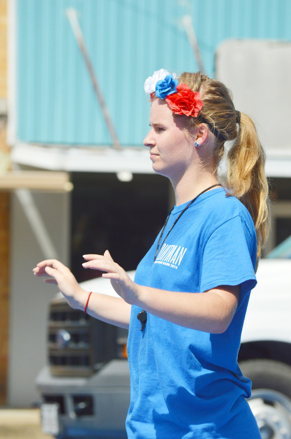 Drum major Elizabeth Turner leads the Proud Blue Band during the homecoming activities on the square in downtown Quitman.