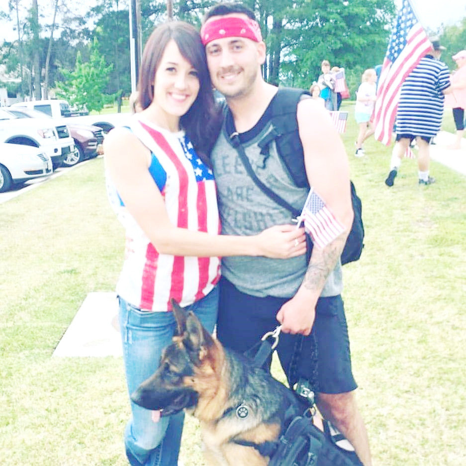 Veteran Harley Thompson with his girlfriend, Caitlin Moore, and his service dog Chacco that disappeared from his backyard Wednesday evening. This photo was taken in Tyler at the Veterans PTSD and Suicide Awareness Hike in Tyler in which participants “do 22 kilometers and 22 pounds in support of the 22 every day that kill themselves.”