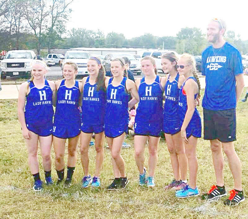 The Lady Hawks varsity cross country team took second place at the district meet.