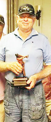 SGA Champion Elroy Doggett holds his SGA trophy.