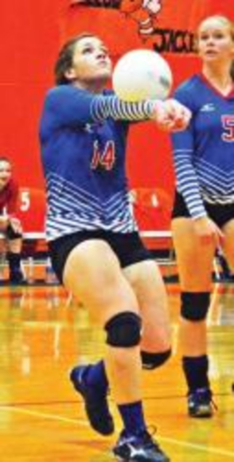 Sophomore Cammie Hicks is shown here completing one of her assists during the Lady Bulldogs win at Mineola last Tuesday to clinch a playoff spot.