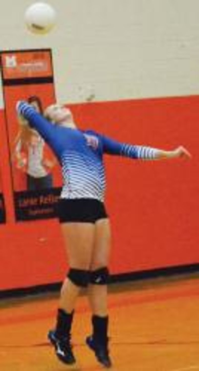 Qutiman junior Macy Wilson delivers a jump serve in last Tuesday's win 3-0 at Mineola.