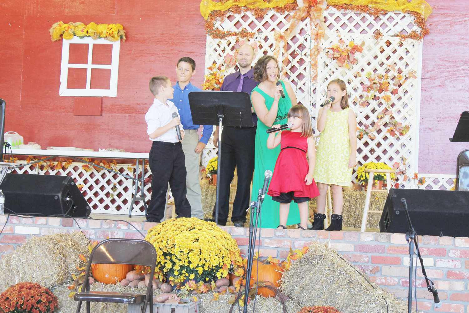 The Hodges family put on a harmonious and lively presentation of show tunes immediately after the stage was cleaned up from the Pie Eating Contest.