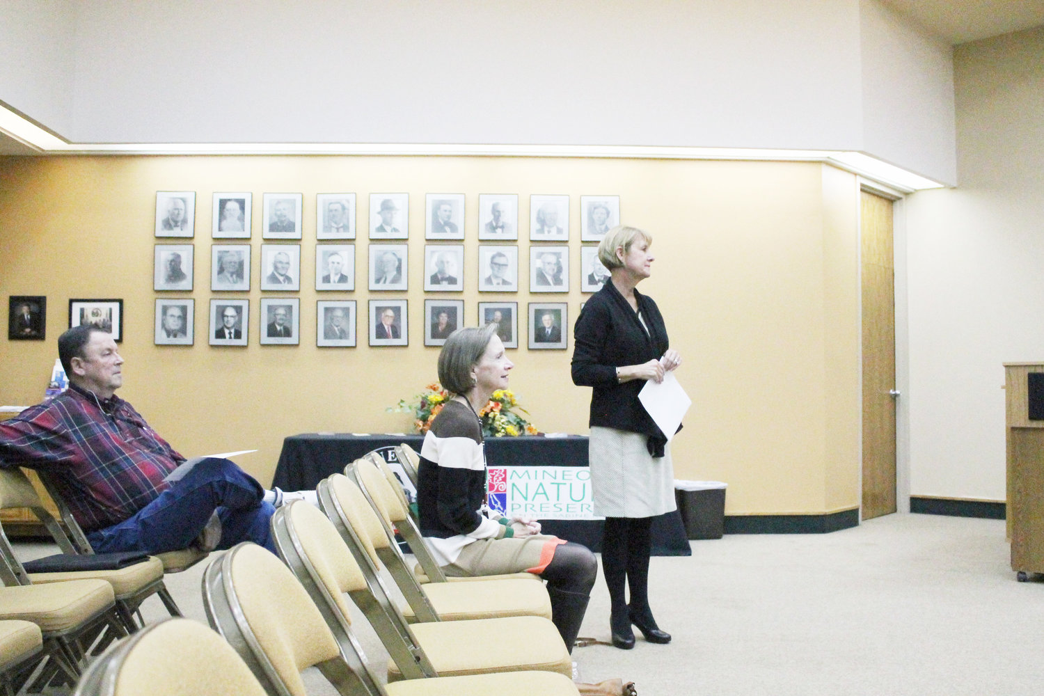 Judy Jay Green, standing, and Sally Jay, attended the November Mineola City Council meeting to make known that they were donating the parking lot at Commerce and Pacific Street, in keeping with their later father Lester Jay’s wishes. (Monitor photo by Doris Newman)