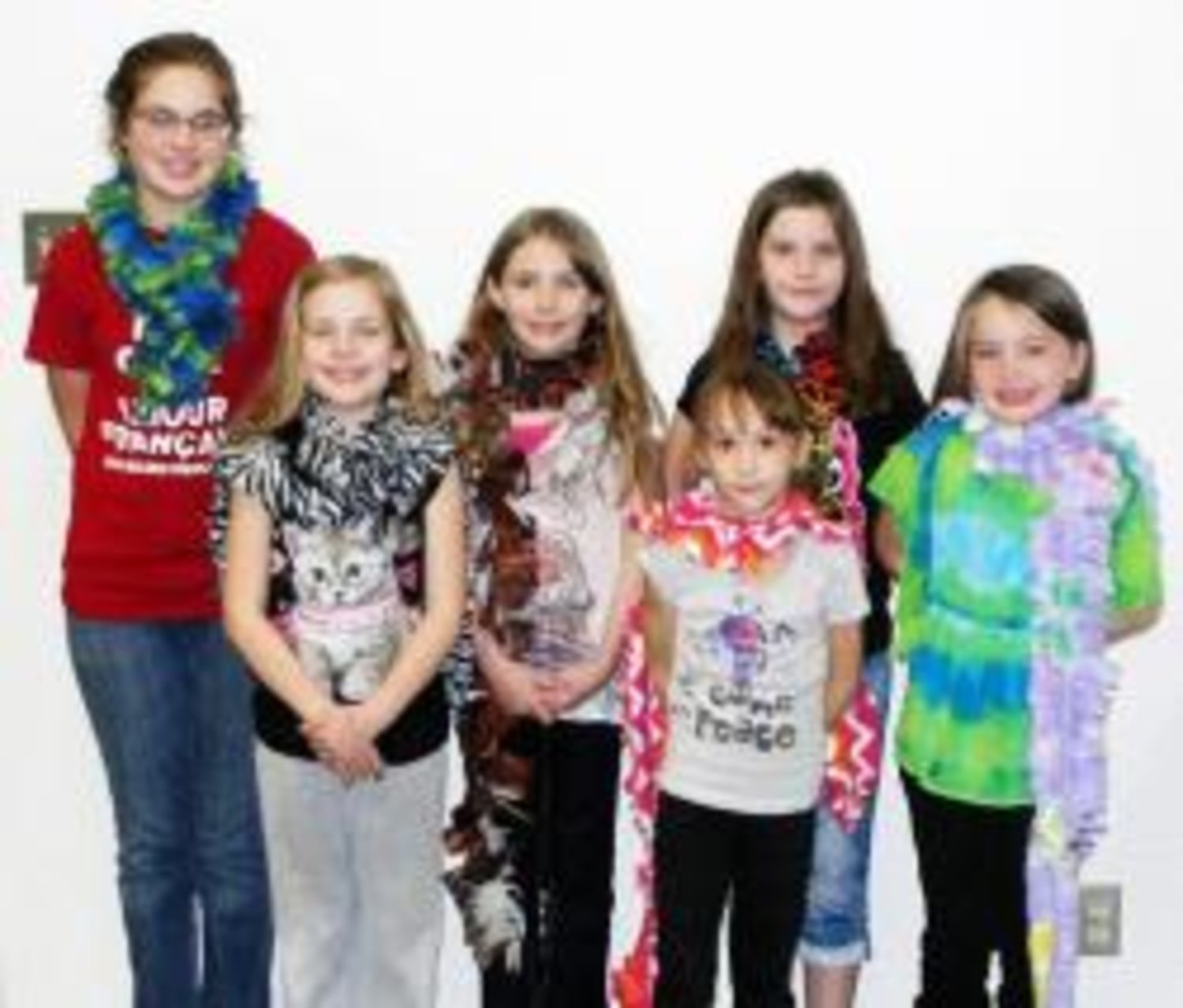 Pictured here are 4-H members who participated in the recent 4-H Clothing Workshop, where they each made their own fleece scarves. Back row, from left to right: Rachel Hays, Ashley Warren, Sara Cross and Destaney Warren. Front row, from left to right: Mia Backer and Faith Gaines.