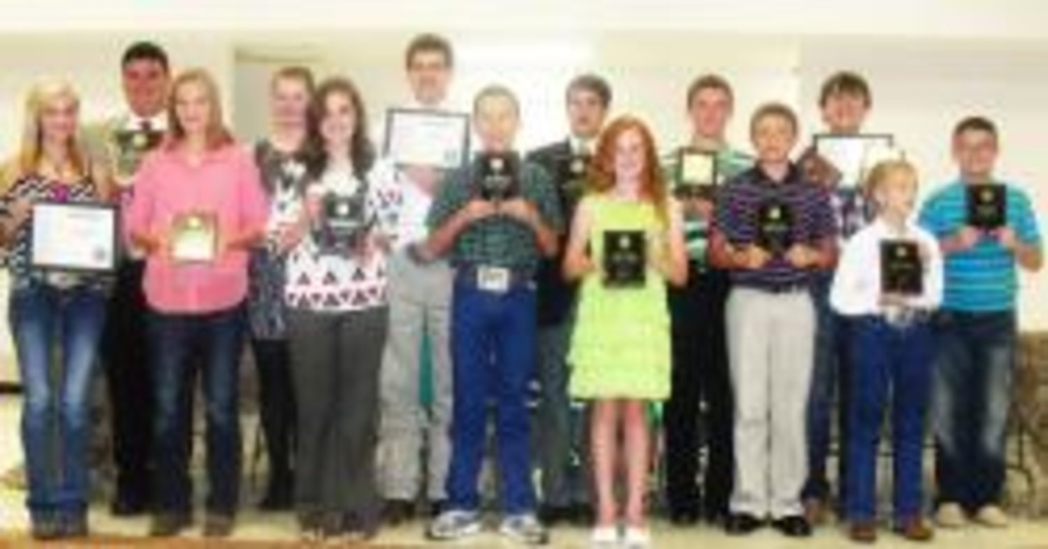 These Wood County students were honored at the annual 4-H Awards Banquet on Oct. 8. Front row, left to right: Hannah Chaney, Kendall Busby, Rachel Hayes, Curtis Perkins, Ahneka Tullos, Luke Kindle, and Dawson Chaney. Back row, left to right: Zack Asbill, Anna Carter, Jhett Jackson, Zachary Finch, Jake Kindle, Tud Krier and Wyatt Bashioum.