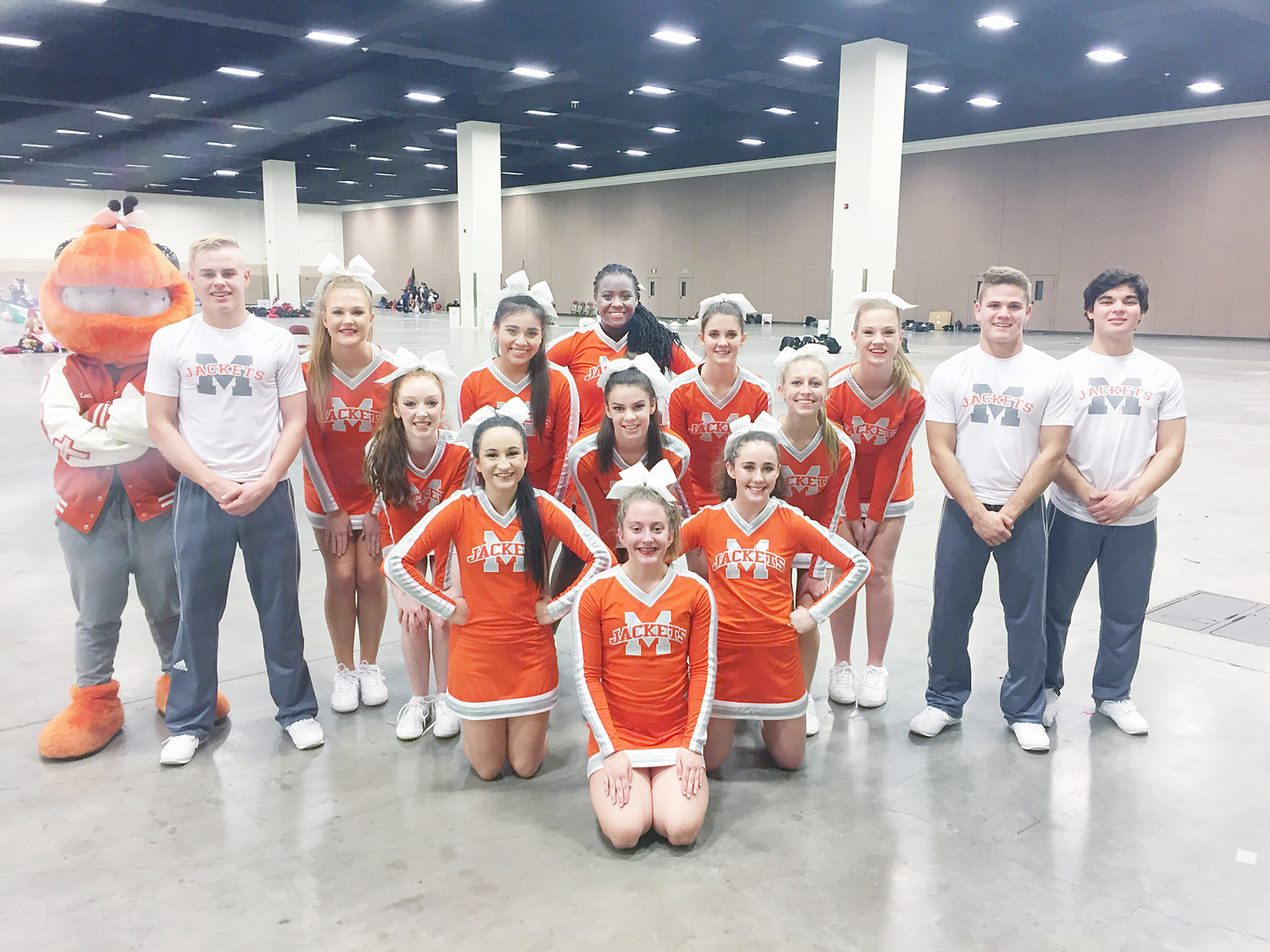 The Mineola High School Cheer Squad placed fourth in the Small Coed Division at the 2nd Annual Texas UIL Spirit State Championship in Ft. Worth on Jan. 11. At the UIL Spirit State Championships schools are judged in three categories: fight song, time-out band dance and time-out cheer. Pictured are, front row, from left, Gracie Castleberry, Melea Bedford and Emma Brian; back row, from left, Lacie Brown (Buzz), Seth Hudgins, Hallee Griffin, Alexia De la Paz, Tiara Stephens, Caitlyn Hudson, Spring Coleman, Aaron Stanford and Spencer Jones; and middle row, from left, Holly Griffin, Emily Jones and Tristan Kirk. (Courtesy photo)