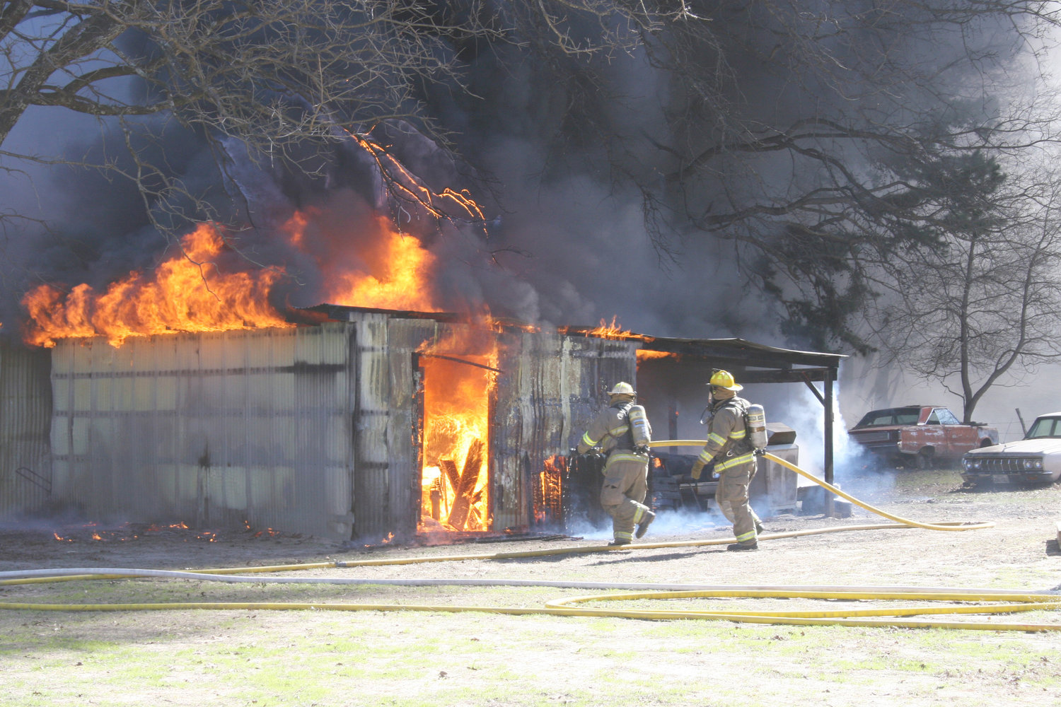 Firefighters from four different departments battled this shop fire Sunday east of Mineola.  (Photo courtesy of J.R. Coffman)