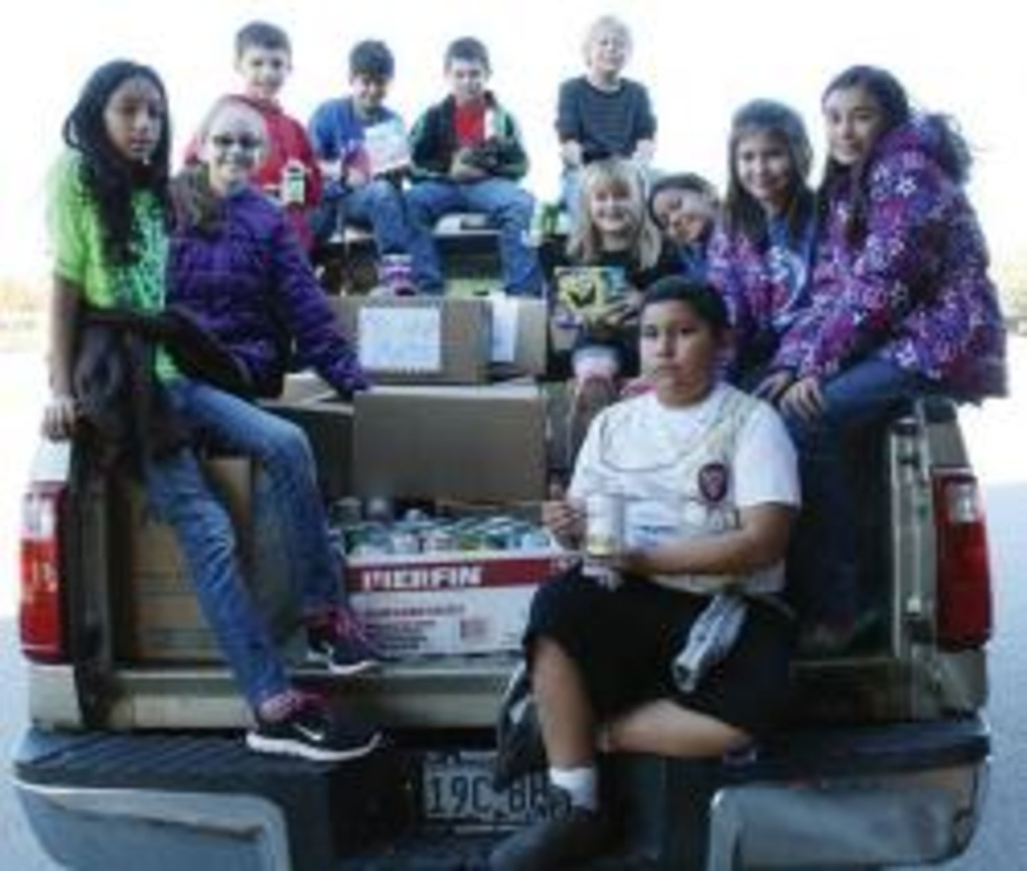 Quitman Elementary School students recently completed a canned food drive to benefit needy families. The students collected more than 2,300 cans of food that will be distributed through Quitman's Christmas Sharing- PLUS on Dec. 8. Pictured, left to right, are Paws Squad members Jennifer Ibarra, Lucy Brannon, River Chaney, Nicholas Barrett, Marcus Pollard, Kalen Wilkerson, Katherine Hudman, Citlaly Flores, Alexie McLemore, Kayla Munger and Oscar Roman.