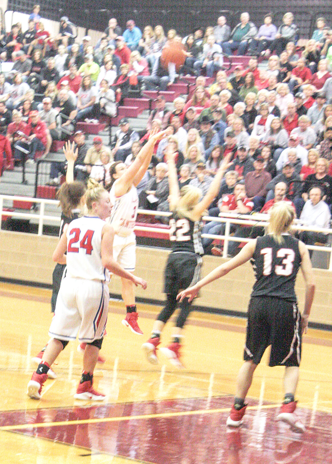 Shelby Wright (3) launches a long-range bomb for Alba-Golden’s only successful three-point shot of the night with 37 seconds left to play in the Regional Semifinal game with Winnsboro Friday night. That bucket cut Winnsboro’s lead to three points, 53-50. However, it was too little, too late and the Lady Panthers fell 56-50 to be eliminated from the playoffs.