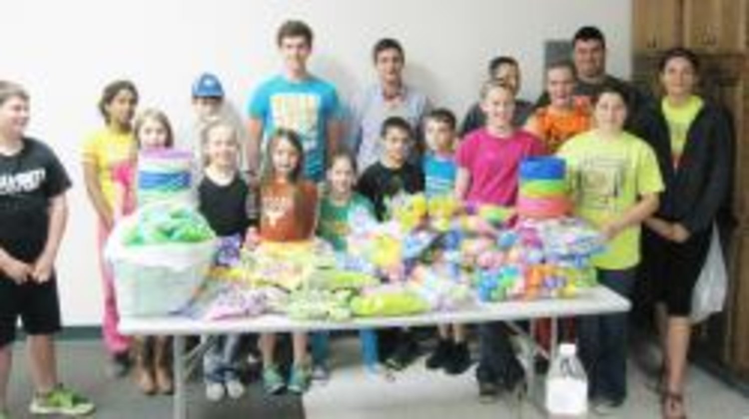 Pictured are members of the Quitman 4-H Club as they continue their community service tradition of filling Easter baskets and providing these for the Wood County Special Education classes. The Quitman 4-H Club will host an Easter Egg Hunt for these students on Thursday, April 17th. Photo courtesy of the Wood County Extension Office.