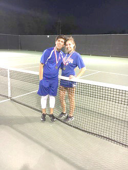 Quitman’s Diego Flores and Kelly Murphy won the district tennis mixed doubles championship and advance to play at region in Tyler.