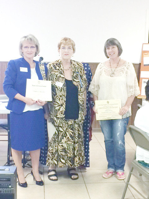 Susan Few and Kelly Lindsey accept certificates from Terri Bentley.  (Courtesy photo)