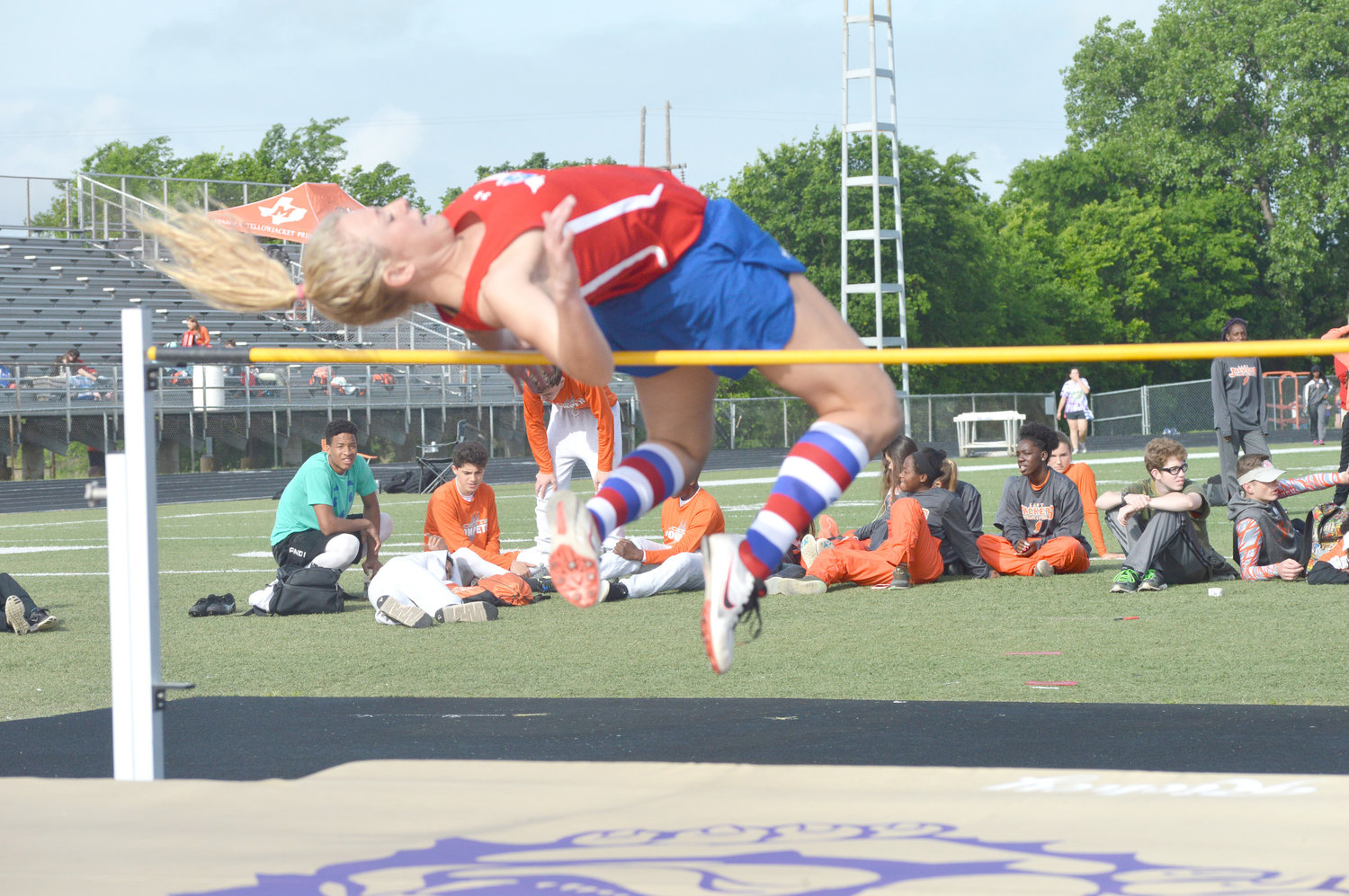 Alba-Golden’s Gracie Pendergrass clears the bar in the high jump competition at the district meet last Thursday. (Monitor photo by Larry Tucker)