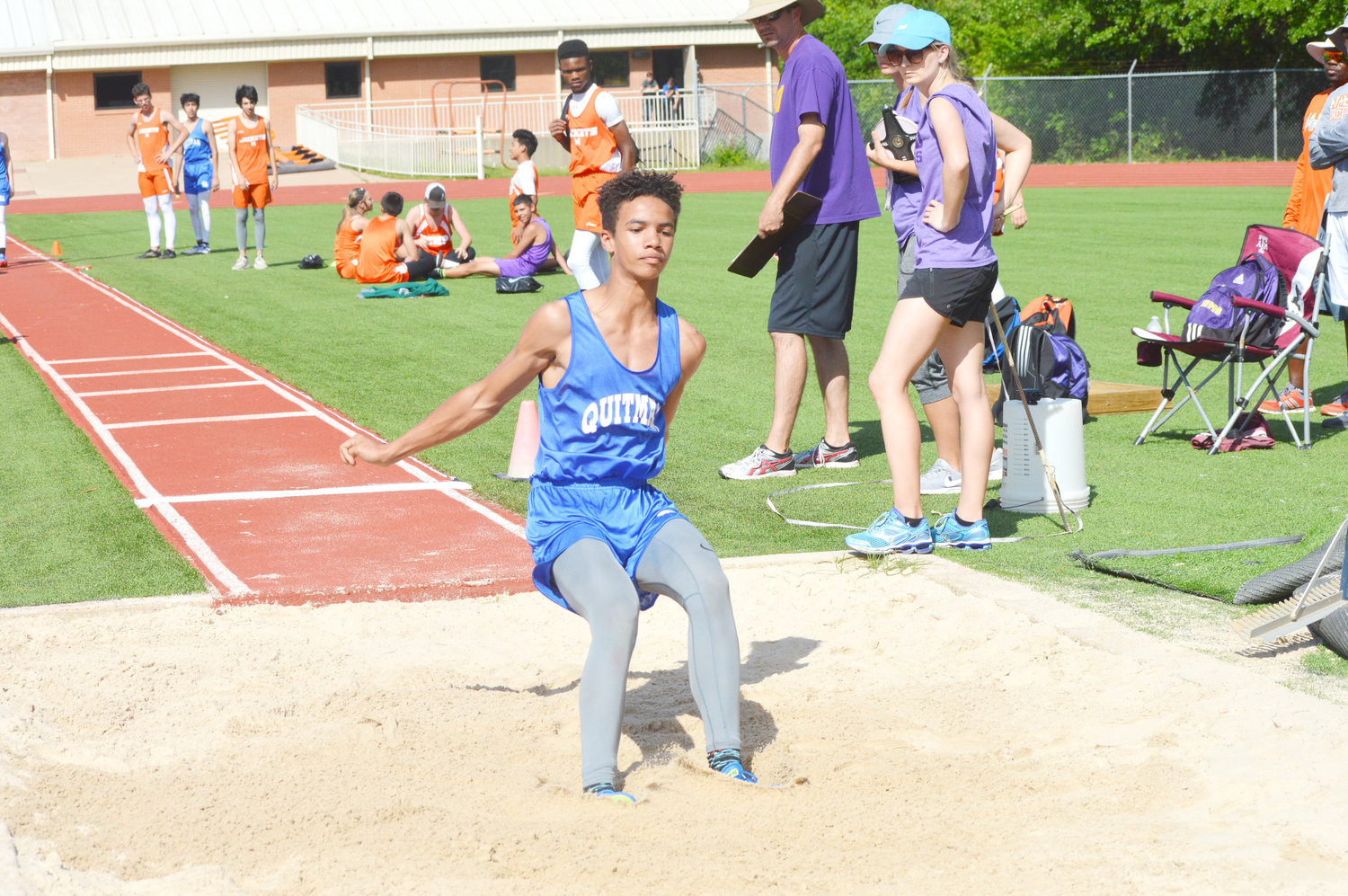 Quitman’s Aiden Stewart has a nice landing at the junior high track meet held in Mineola. (Monitor photo by Larry Tucker)