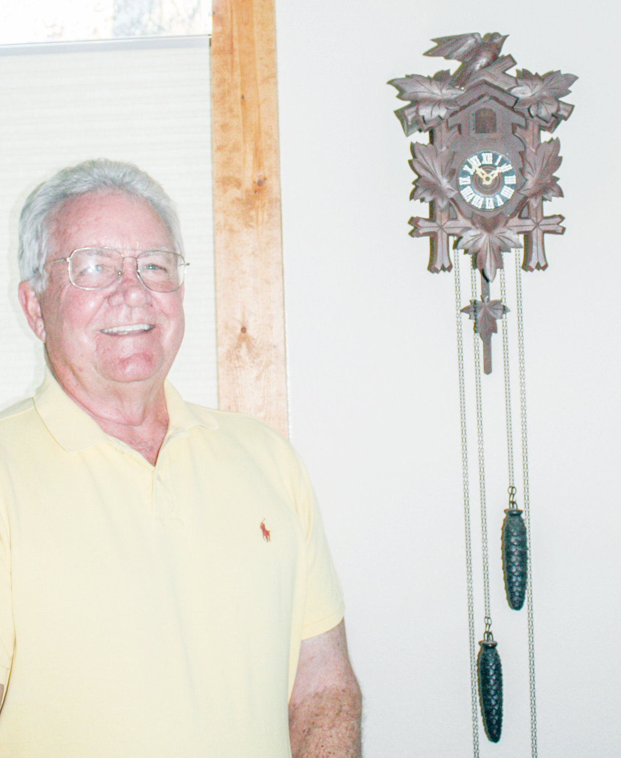 Karl Foerster keeps his Black Forest cuckoo clock -- a keepsake from Germany -- in a place of honor on his bedroom wall at his Hainesville Ranch. (Monitor photo by Tommy Anderson)