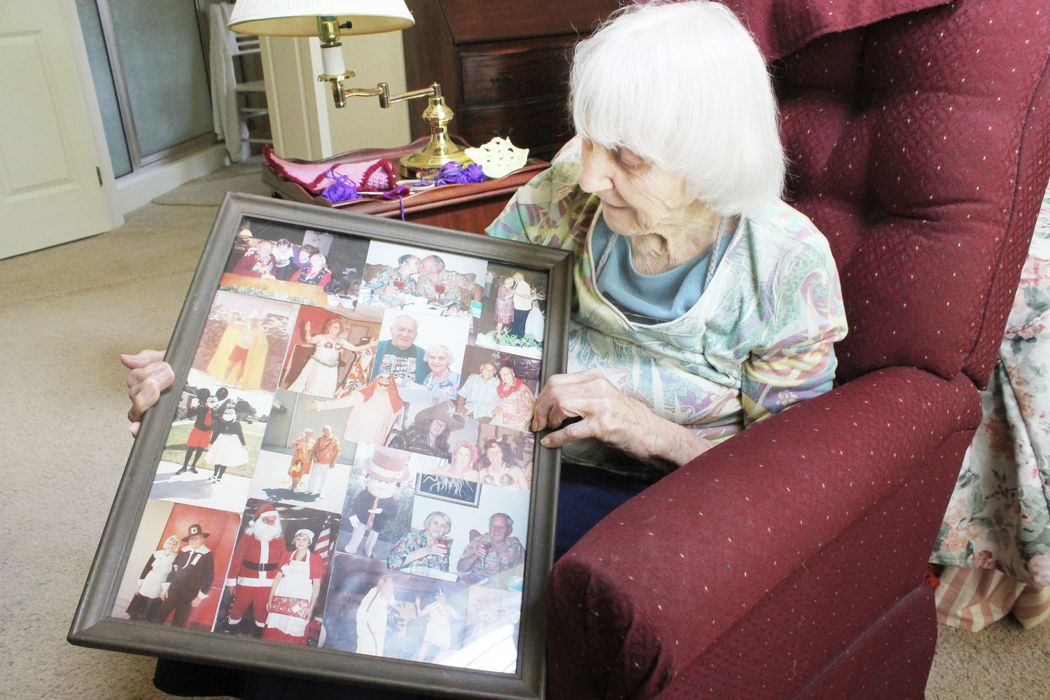 This framed collage displays glimpses of the Mineola 102 year old’s very full life. (Monitor photo by Doris Newman)