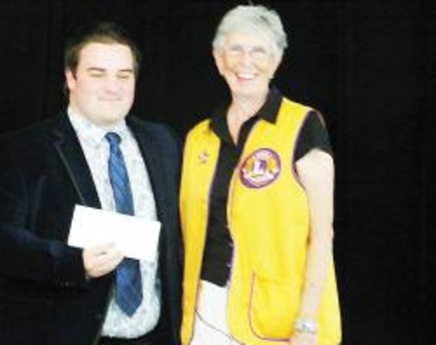The Yantis-Lake Fork Lions Club awarded the Lion Bernie Shoemaker scholarship in the amount of $1,000.00 to Caleb Isaac Allen of the Yantis Independent School District. Allen was the salutatorian of the 2014 graduating class of Yantis High School. The scholarship was presented by Lion Betty Stribley at the Yantis ISD's Scholarship Program on June 4, 2014.