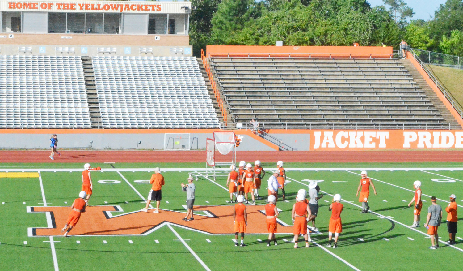 Skill players begin workouts early Monday morning, Aug. 1, on the first day of two-a-days.