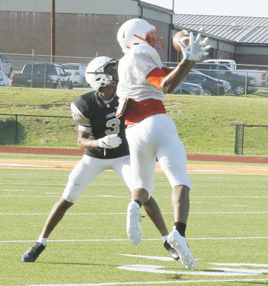 A Mineola receiver makes a great catch on a good pass from Shaw Franklin. Mineola hosts Caddo Mills Thursday at Meredith Stadium for their final tune-up before opening at home Aug. 31 against Wills Point.