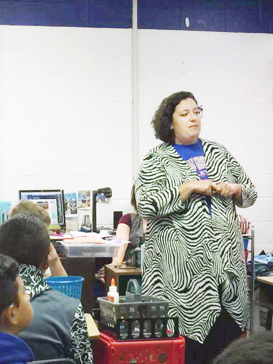 Wood County juvenile probation officer and Together, Against Drugs program leader Melanie Whitehurst holds a class discussing choices and prevention of drugs and alcohol at one of the area schools.