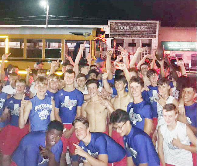 The Quitman Bulldogs returned home from their win at Cumby with a big pep rally on the courthouse square in downtown Quitman.