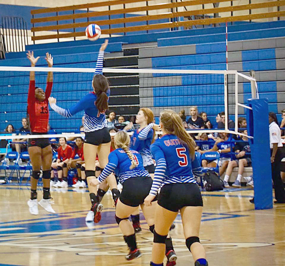 Ava Burroughs delivers a kill shot in action at the White Oak Tournament last Thursday.