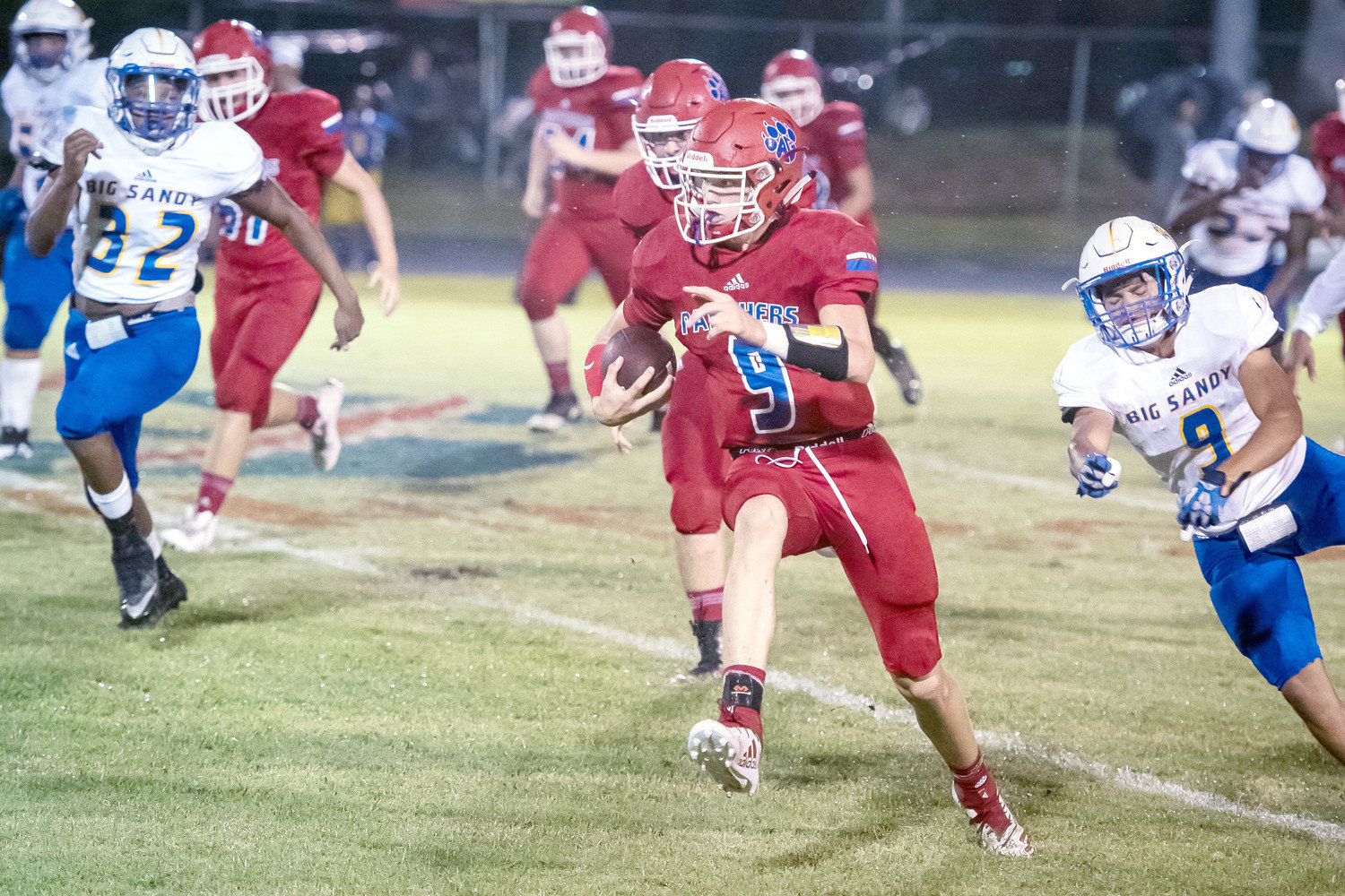 A-G Panther quarterback Zane Smith takes off on a run against Big Sandy. Big Sandy led 6-0 at the half when the game was halted due to the weather.