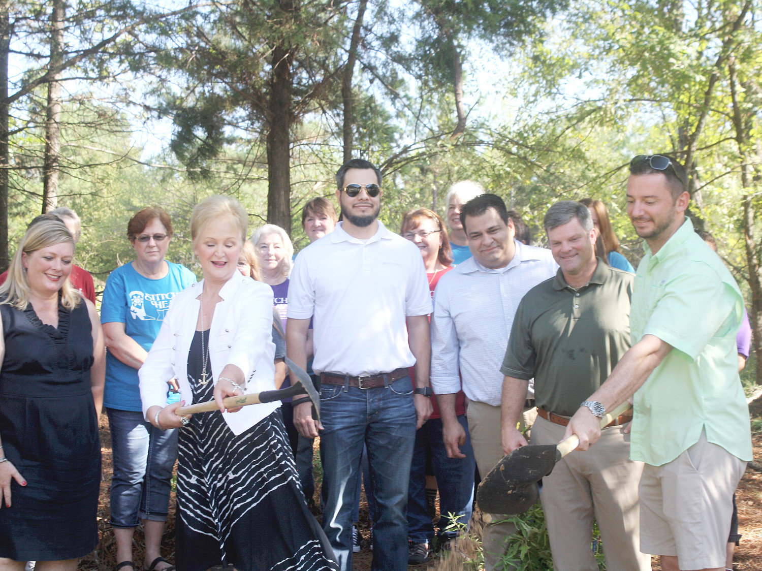 Stitchin’ Heaven co-owners Deb and Clay Luttrell shovel dirt for the groundbreaking ceremony on Sept. 6 at its future location in the Quitman Business Park. From left to right: Quitman Development Corporation Executive Director Denea Hudman, Deb Luttrell, Marc Loredo of BBVA Compass Bank, Quitman city secretary/administrator Andrew Kloefkorn, Quitman Mayor David Dobbs and Clay Luttrell.
