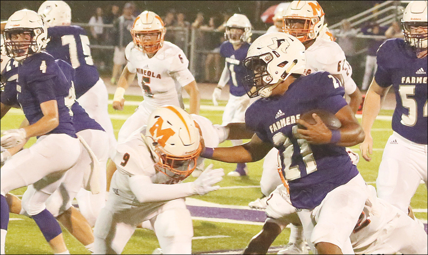 Mineola’s Dalton Rogers makes a great defensive stop to break up a pass play in the ‘Jackets win at Farmersville.