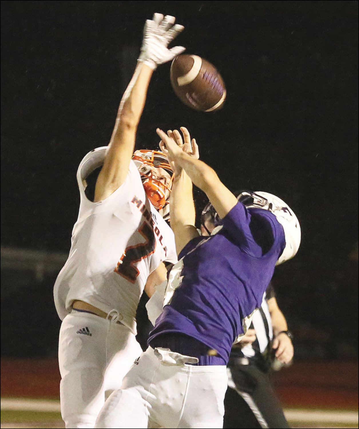 Mineola’s Dalton Rogers makes a great defensive stop to break up a pass play in the ‘Jackets win at Farmersville.