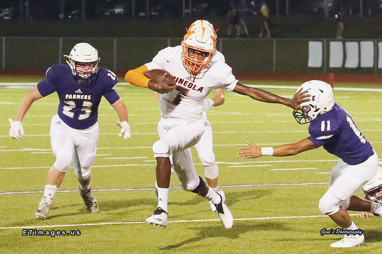 Mineola’s Shaw Franklin runs for some of his 243 yards rushing on just 13 carries for a phenomenal 18.7 yards per carry while leading the ‘Jackets to a 40-12 win over Class 4A Farmersville.