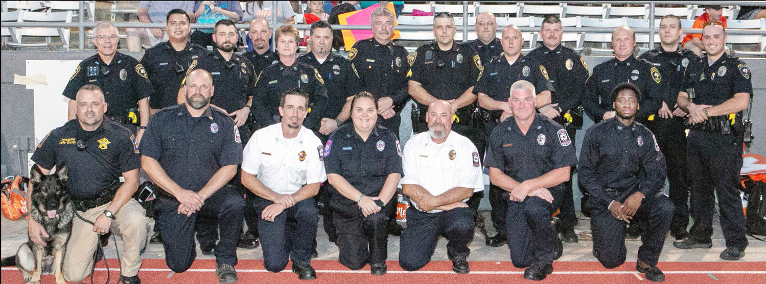 In appreciation of the dedication and service of first responders, Mineola ISD recognized members of medical, law enforcement, fire departments and other first responders prior to the football game against Big Sandy last Thursday night at Meredith Memorial Stadium. (Photo by Gene’s Photography and Etimages/us)