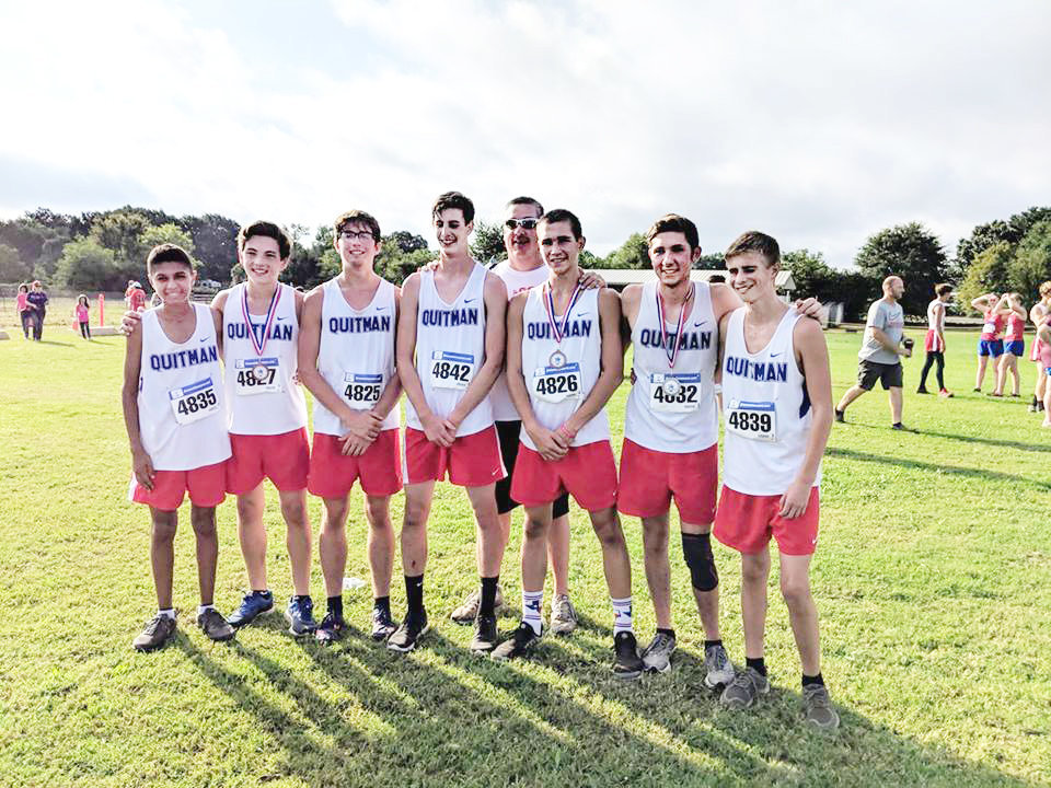 Quitman’s boy’s cross country team brought home the district championship Saturday and advances to the regional meet in Grand Prairie Oct. 22. They are (left to right): Diego Osornio, Brandon Jimenez, Aiden Corrior, Riley Flanagan, Ben Burroughs, Dalton Brandon and Matthew Smith.