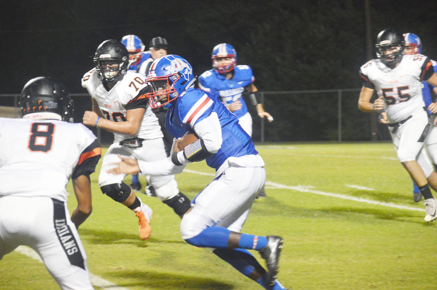 Quitman’s Trey Berry (2) looks for running room in Friday’s loss to Grand Saline.