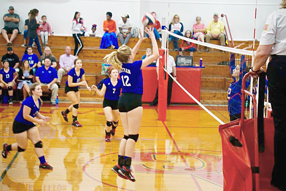 Quitman’s Maddy Whitehurst goes up for one of her kills in Friday’s Lady Bulldog close win at Alba-Golden.