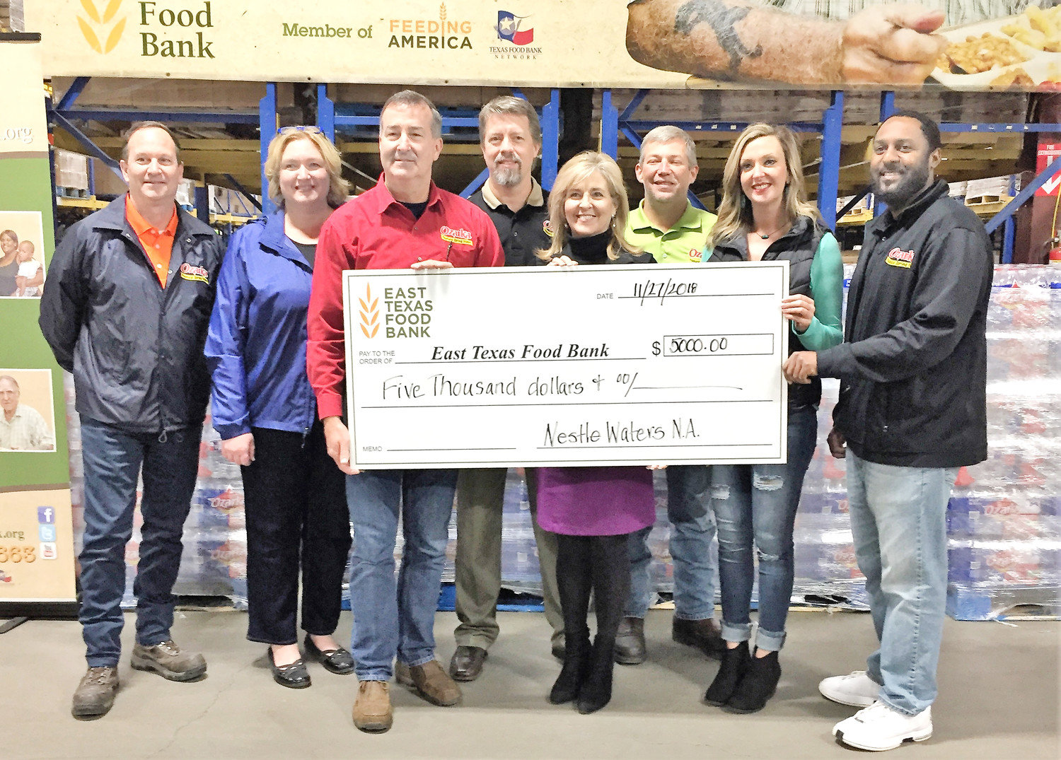 Left to right: Barry Smith, Cheryl Conaway, Jeff Hall (factory manager), Andy Trauger, Donna Spann (director of development and communications for East Texas Food Bank), Jeremy Mathews, Jeri Goswick, and Charles Ridgeway. (Courtesy photo).