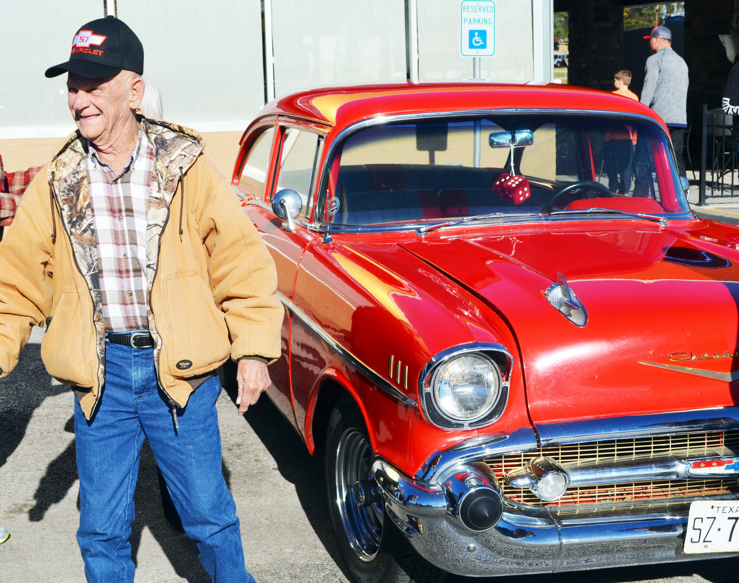 Travis Lloyd is all smiles after climbing out of Wayne Caldwell’s 1957 Chevy in the parking lot of the Dairy Queen in Quitman on Dec. 21. The ’57 Chevy has always been Lloyd’s dream car.