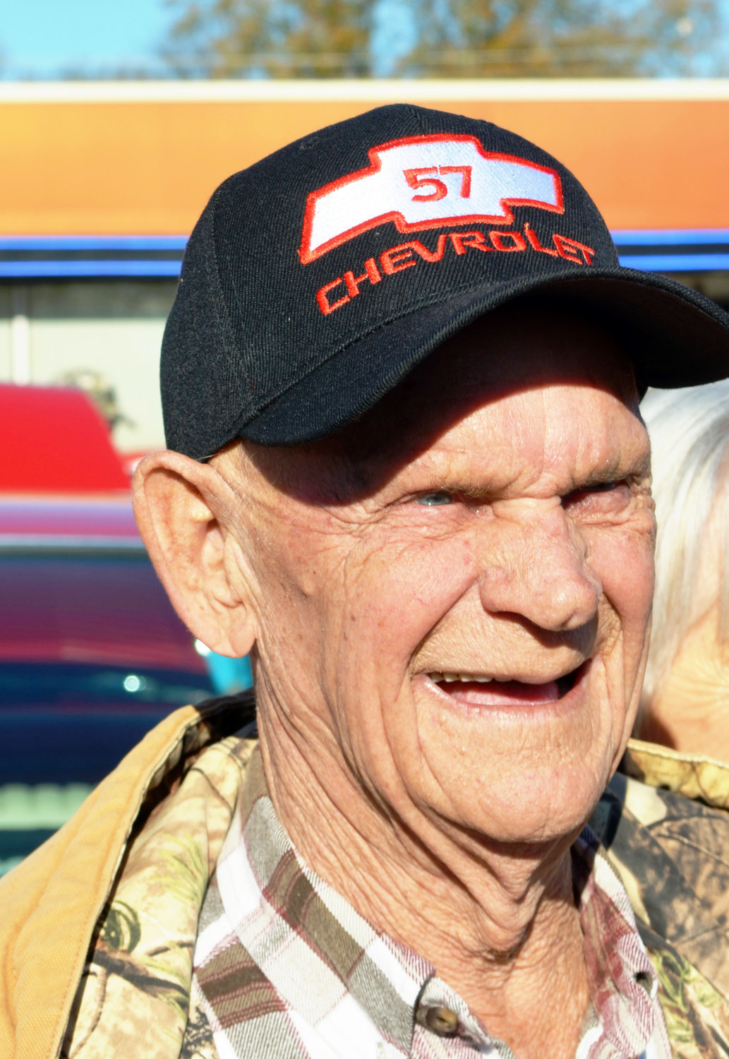 His ball cap signifies Travis Lloyd’s affinity for the ’57 Chevy.