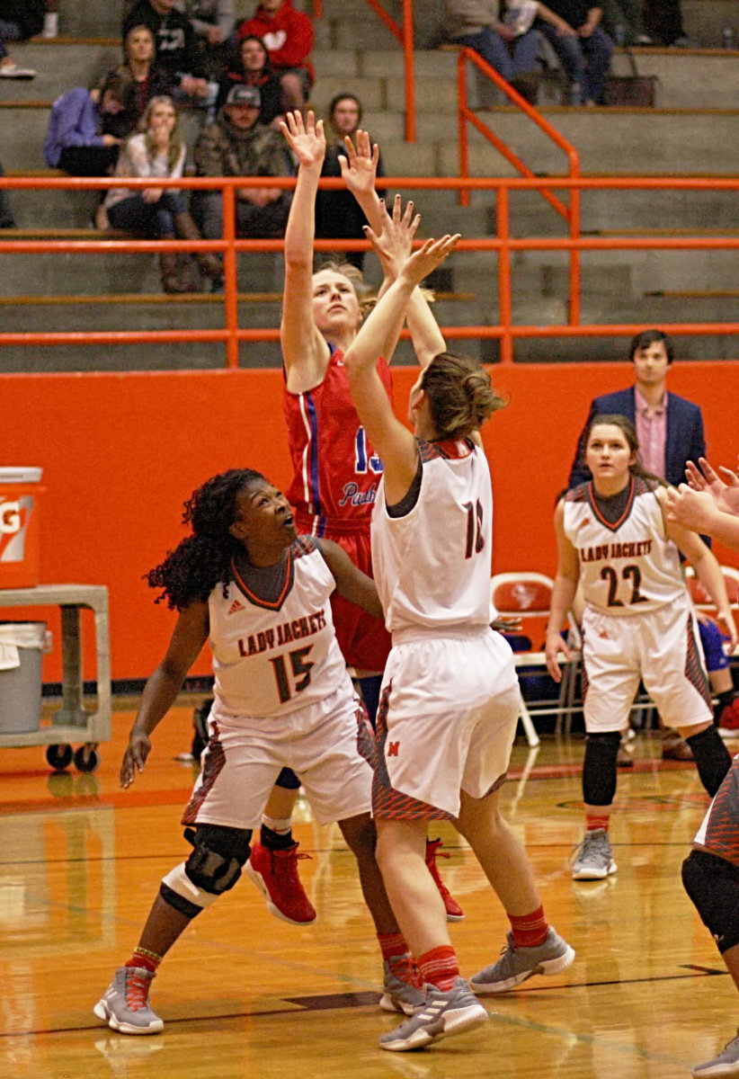 Alba-Golden’s Ginny Carson puts up a shot during the game against Mineola on Friday.