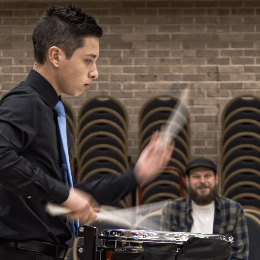Israel Rivera played Pratfalls for solo marching snare drum.