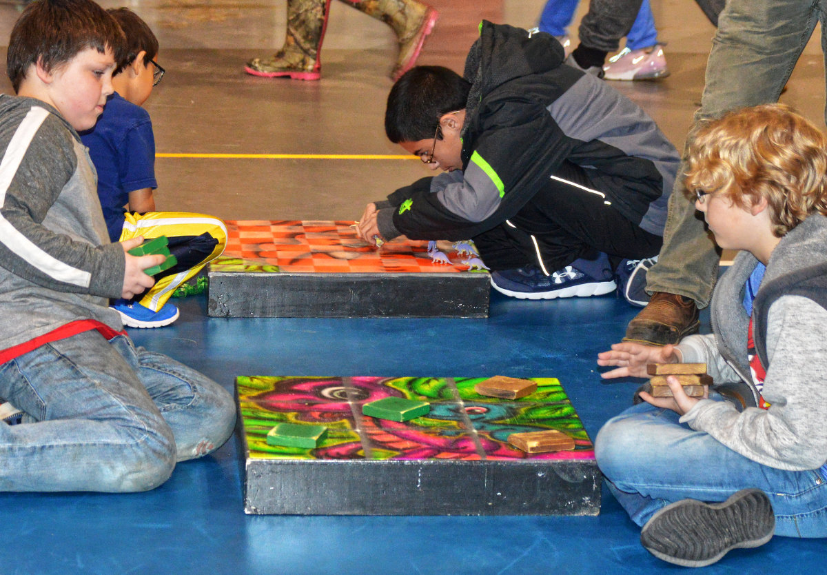 Quitman students play dinosaur themed games during the “Dinosaur Live” event at Quitman Elementary gym on Feb. 7.