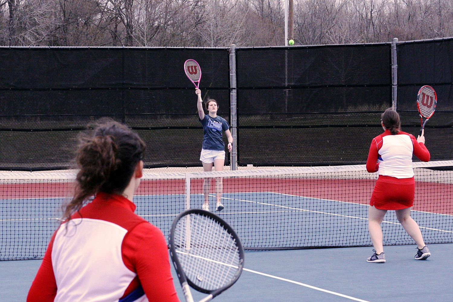 Doubles action at the Alba-Golden Tennis Tourney on March 8.