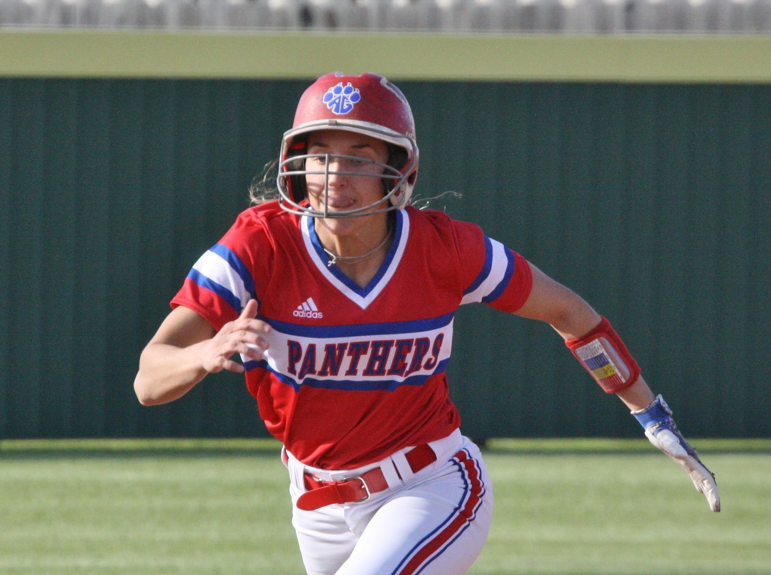 Lady Panther Ashlyn Rogers takes off from second on a successful attempt to steal third base. 