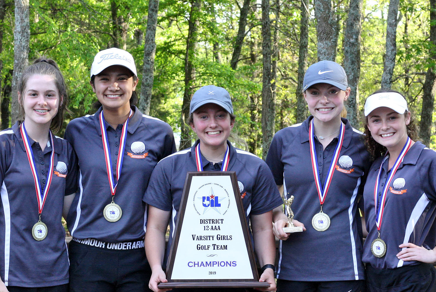 Mineola's 2019 District 12-3A girls golf championship team.  From left are Makayla Mahlstadt, Valerie Garcia, Melea Bedford, Ava Johnson and Sunni Ruffin.