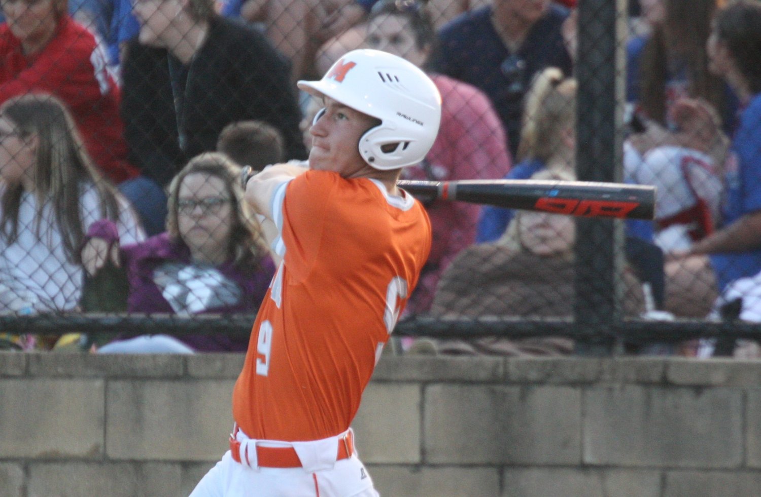 Mineola’s Cole Castleberry belts a run-scoring triple in the third inning against Alba-Golden.