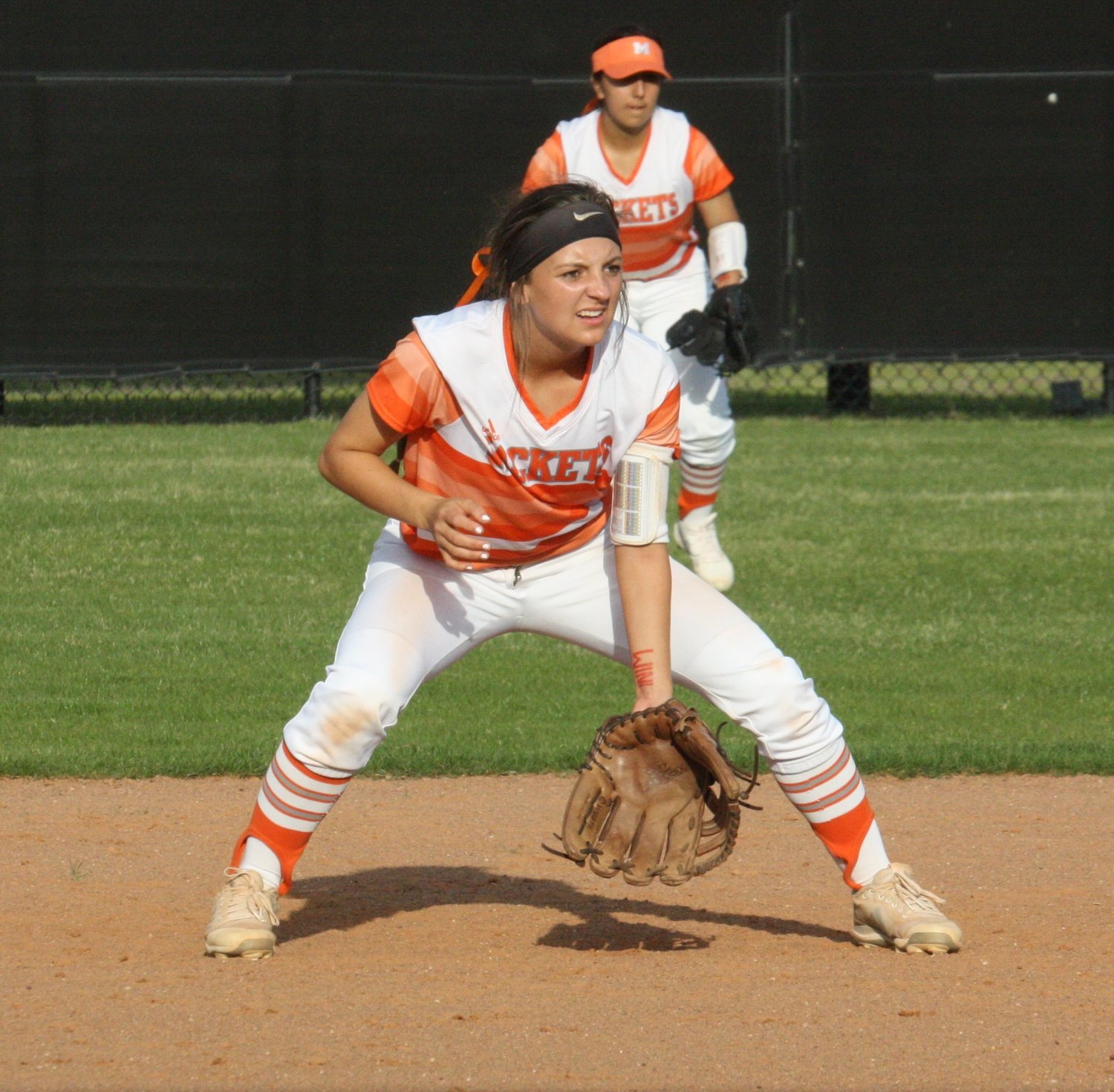 Mineola second baseman Breanna Wilmoth fights the setting sun in early action against Grand Saline.