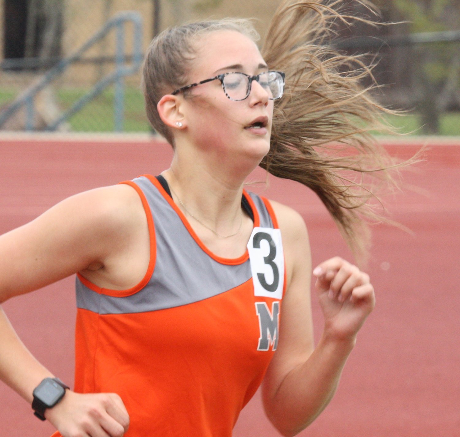Mineola distance runner Hannah Zoch digs deep for the finish.