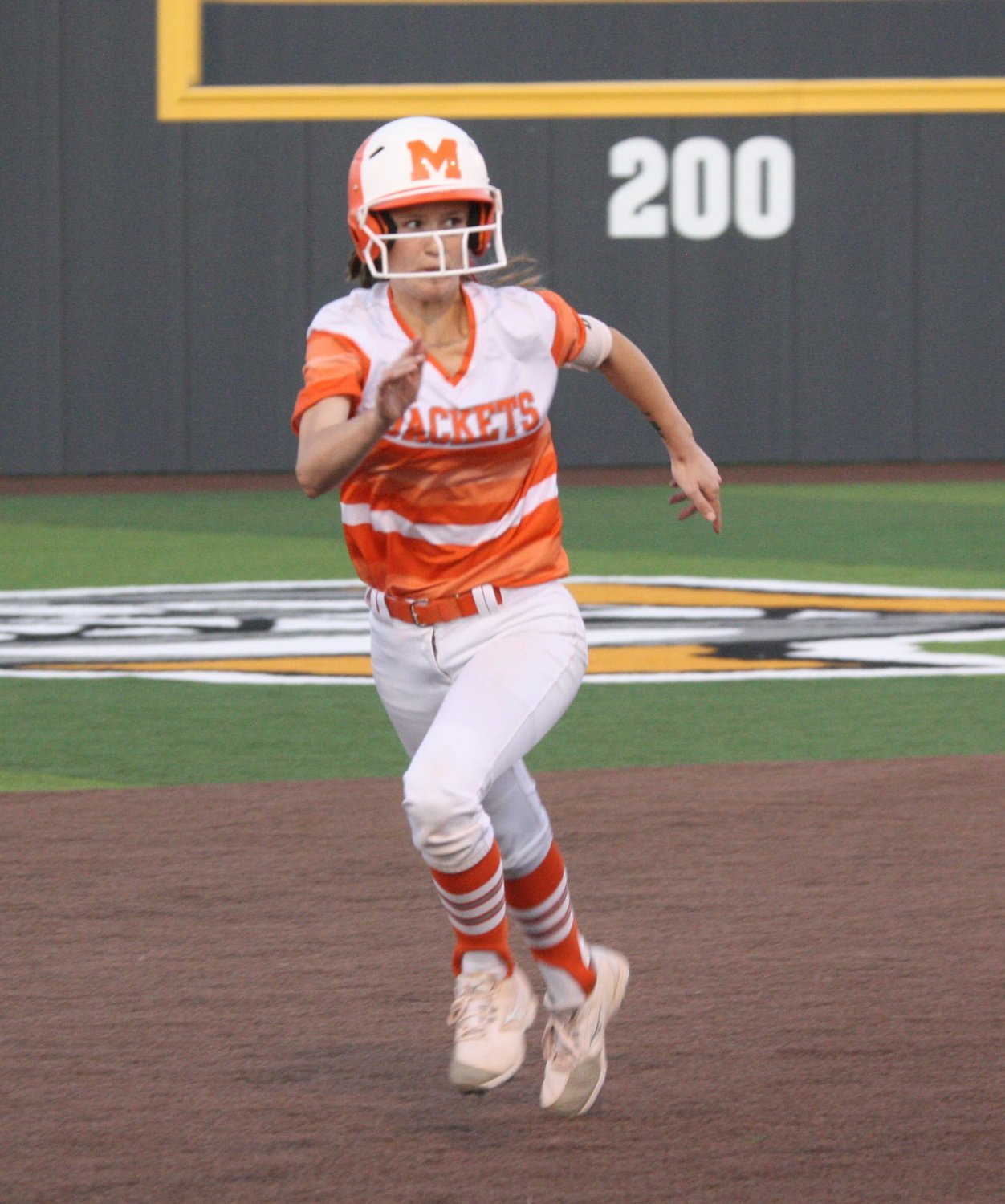 Emily Wiley rounds the bases in second-inning action against Scurry-Rosser.